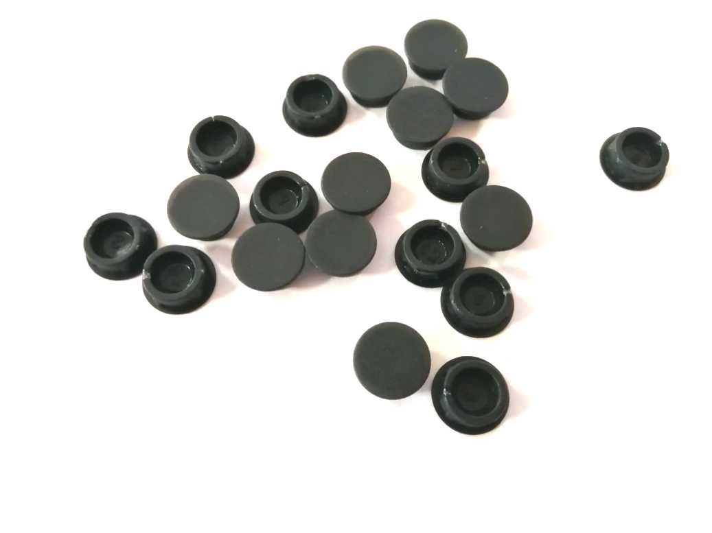 Fekete műanyag furattakaró gombok